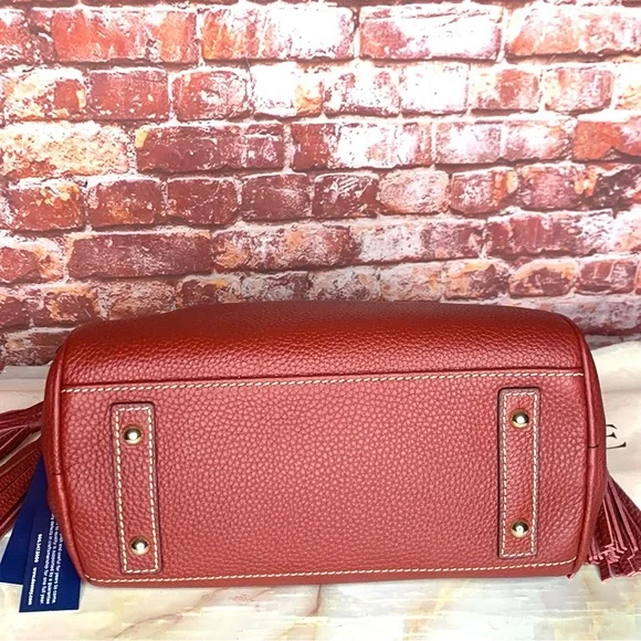 Dooney & Bourke Wine Red Pebbled Tassel Shoulder Bag